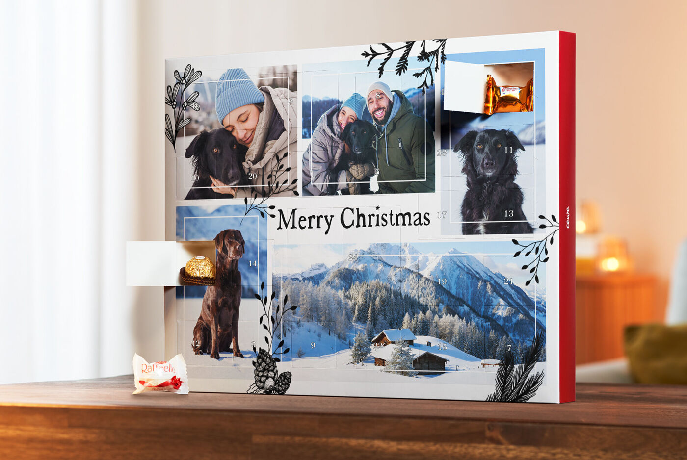 Un magnifique album photo CEWE avec des motifs de Noël et des images d'un chien.